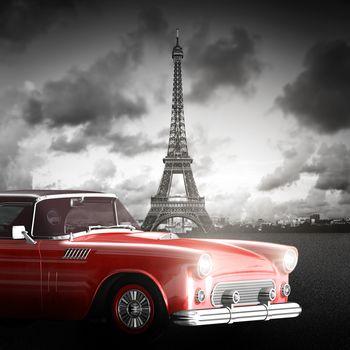 Czerwony samochód na tle wieży Eiffel 
