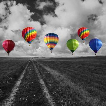 Kilka kolorowych latających balonów